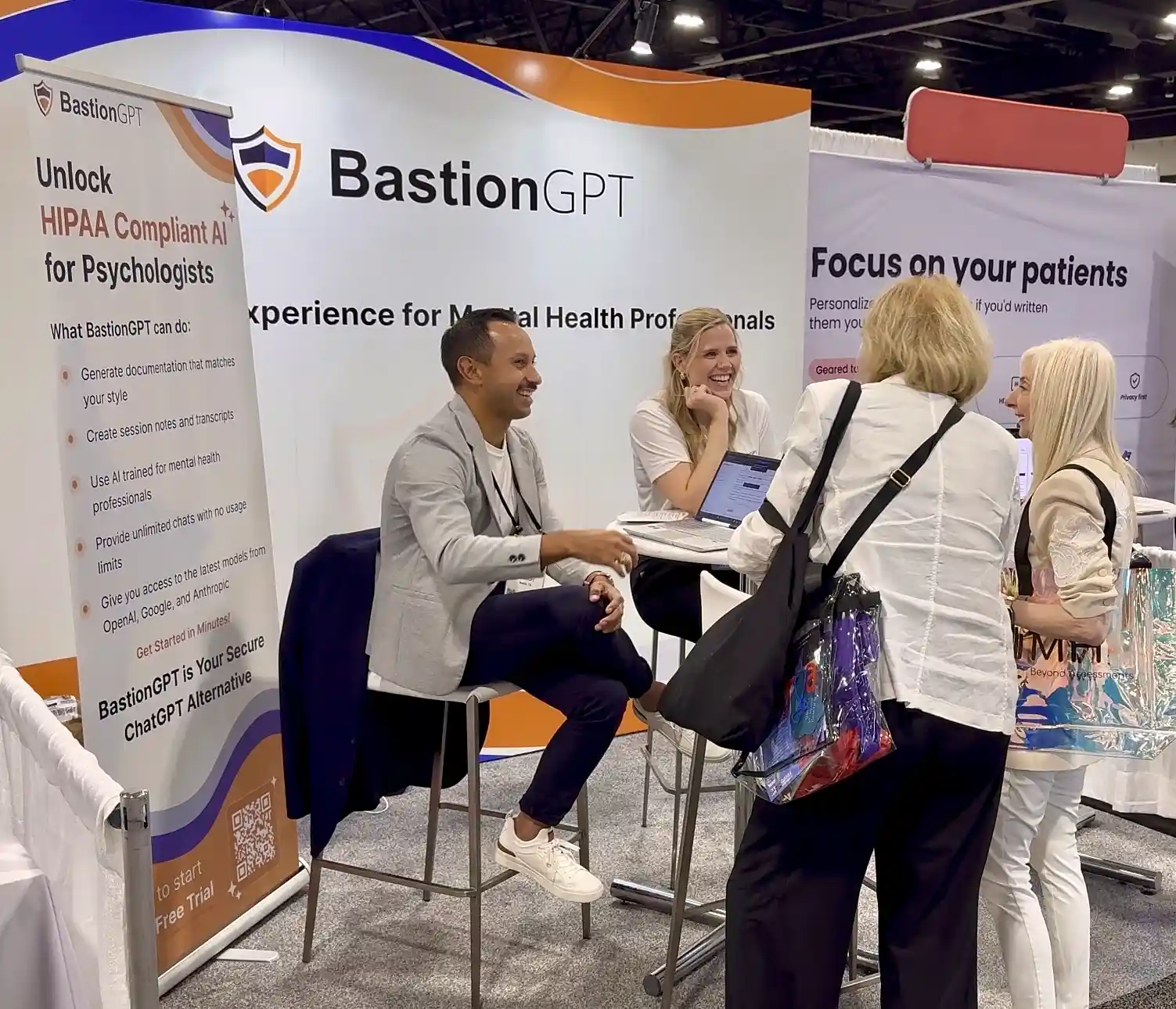 Bastion Intelligence team at the BastionGPT booth, APA 2025 conference
